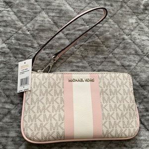 White and pink Michael Kors wristlet